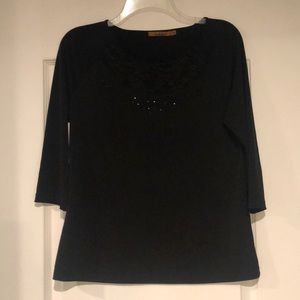 Medium black blouse with design on the neck